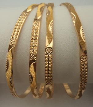 Gold bangles clearance cutting designs